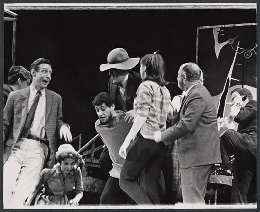 Alec Guiness [hat] and ensemble in the stage production Dylan