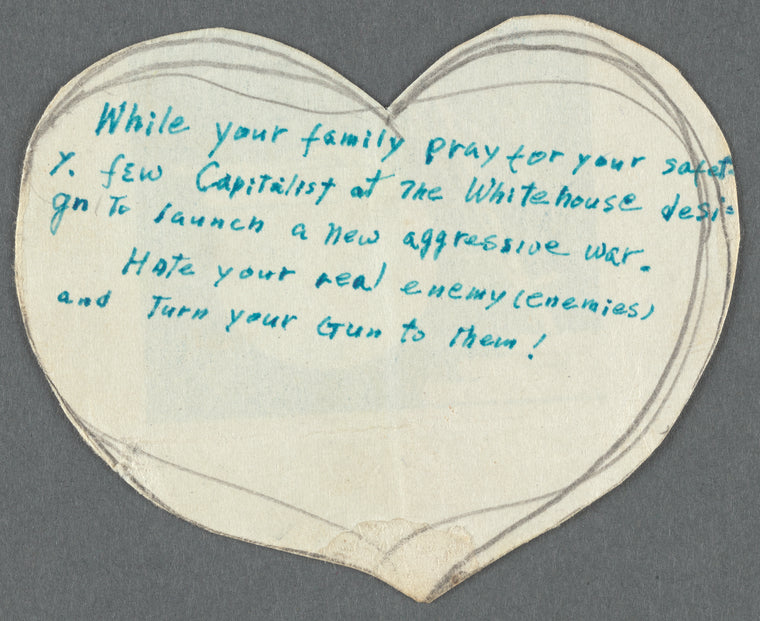 Paper heart-shaped messages in English