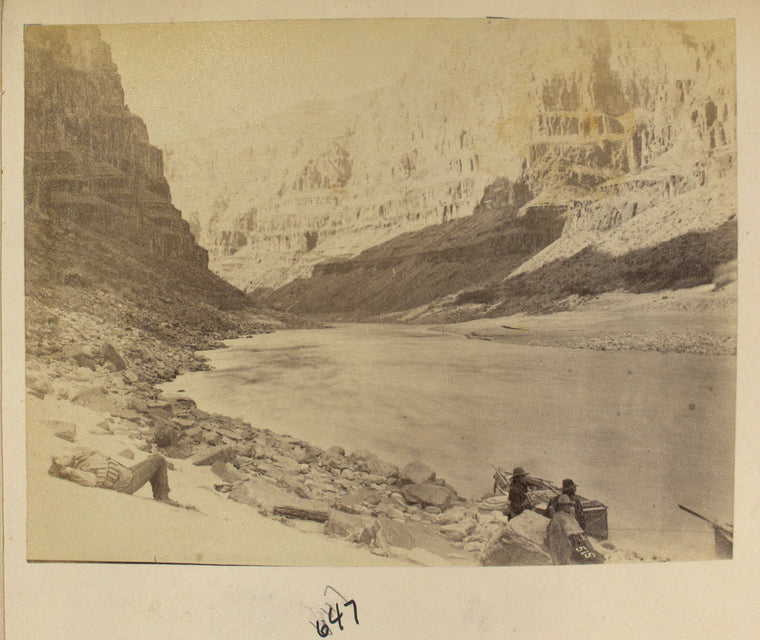Canyon with men and boats