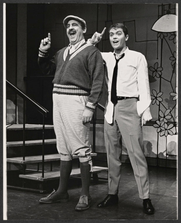 Jeff De Benning and Ronnie Welsh in the stage production How to Succeed in Business Without Really Trying