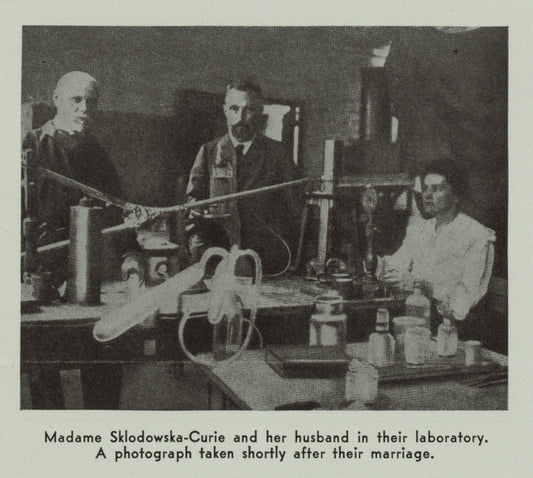 Marie Sklodowska-Curie and her husband in their laboratory. A photograph taken shortly before their marriage