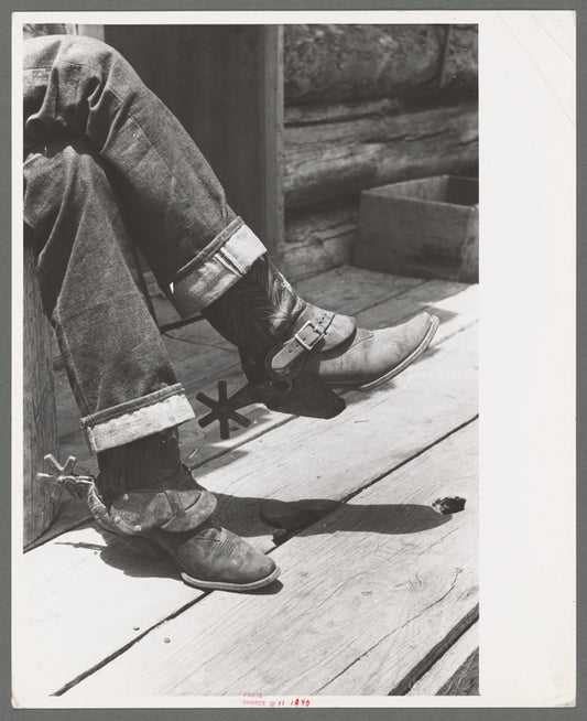 Detail of farmer's blue jeans, boots and spurs. This man was once a cowboy and still prefers the cowboy's dress, Pie Town, New Mexico