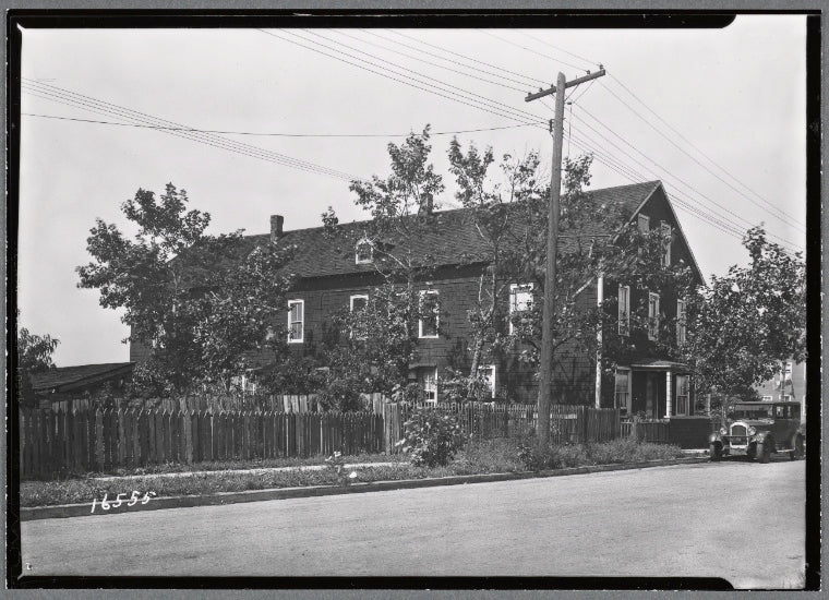 Shingled frame house and yard