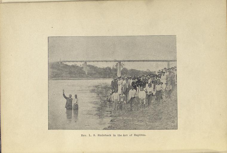 Rev. L. S. Steinback in the Act of Baptism