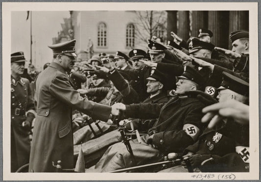 On Heroes' Thanksgiving Day the Fuhrer greeted the war wounded after laying a wreath at the Honor Monument on the Unter den Linden.