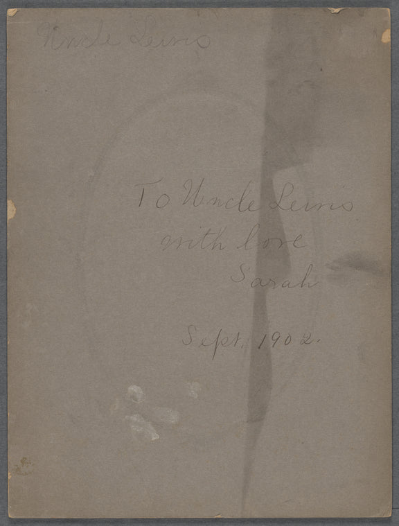 Studio portrait of Sarah Myers Blackwell standing next to table
