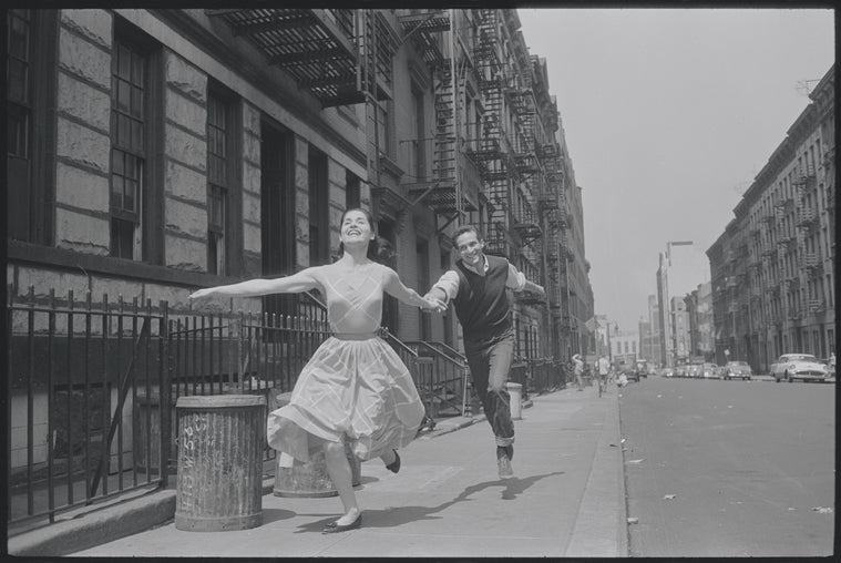 Carol Lawrence and Larry Kert on location (West 56th street between 9th and 10th ave) for West Side Story publicity shoot