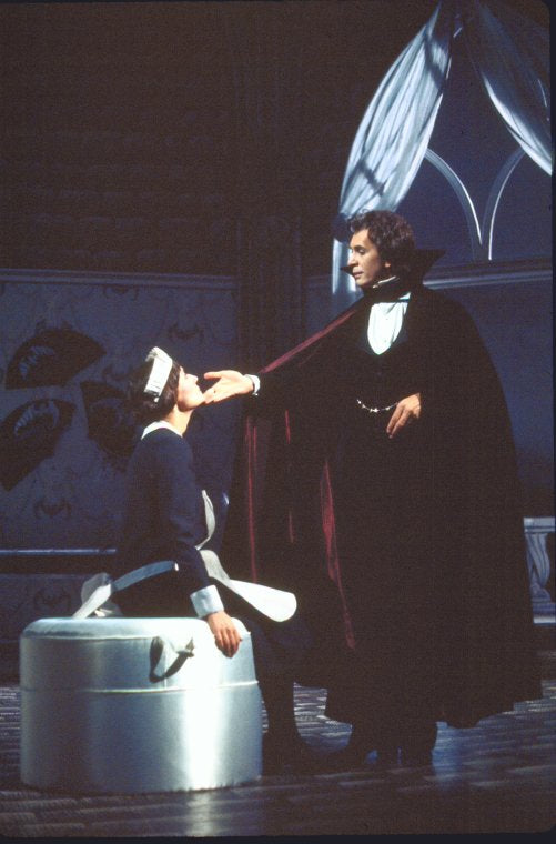 Actors Gretchen Oehler & Frank Langella in a scene fr. the Broadway revival of the play "Dracula." (New York)