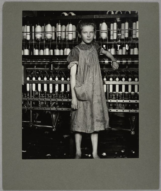 An anaemic little spinner in a New England cotton mill, August 1910
