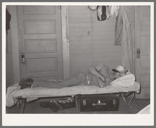 Cook of SMS Ranch asleep after dinner. Ranch near Spur, Texas