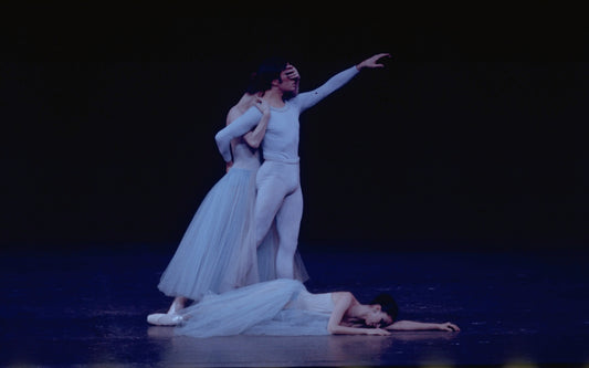 New York City Ballet production of "Serenade" with Kay Mazzo (on floor), Jean-Pierre Bonnefous and Karin von Aroldingen, choreography by George Balanchine *(Note: photo should be reversed) (New York)