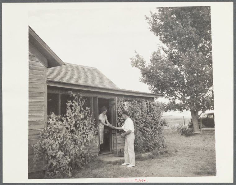 Doctor Tugwell visiting rehabilitation client's home. South Dakota