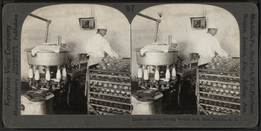 Machine filling bottles with milk, Buffalo, N. Y..