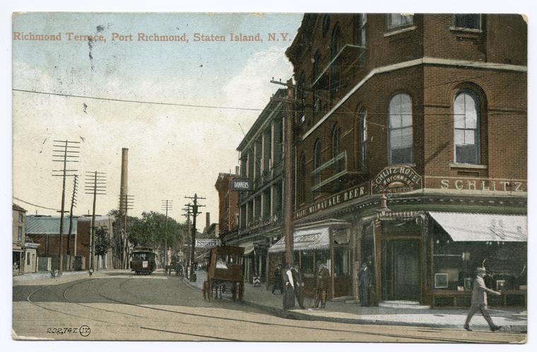 Richmond Terrace, Port Richmond, Staten Island, N.Y.  [trolley, horse-drawn carriage, people in street, Schlitz Hotel on corner, sign advertising Schlitz Milwaukee Beer]