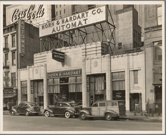 Old exterior with big Coca Cola sign in upper left corner, 1089 Sixth Ave