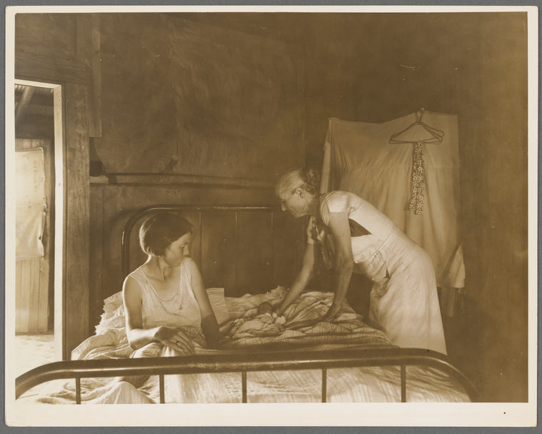 Grandmother, mother, and new born baby of a sharecropper family near Cleveland, Mississippi
