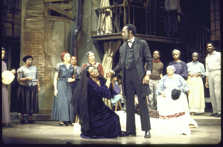 Actors Betty D. Lane & George Robert Merritt (C) w. cast members in a scene fr. the Houston Grand Opera production on Broadway of the opera "Porgy And Bess." (New York)