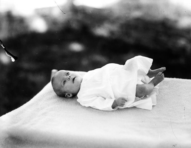 Nora Sayre as baby (feet raised)
