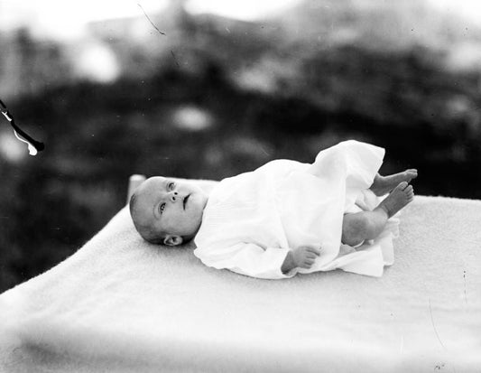 Nora Sayre as baby (feet raised)