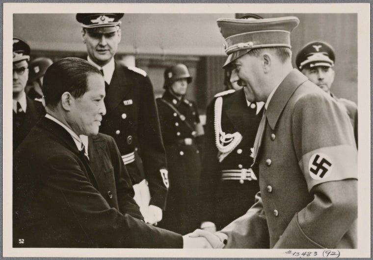 The warm friendship between Japan and Germany finds expression in a Japanese art exhibition in Berlin.  The Fuhrer greets Japanese Ambassador Oshima