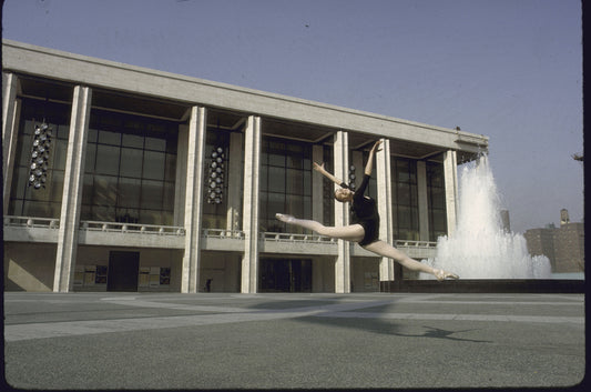 New York City Ballet dancer Patricia Neary leaps in front of the newly built State Theater at Lincoln Center (New York)