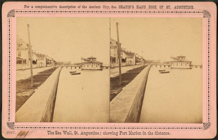 The Sea Wall; showing Fort Marion in the distance.