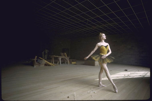 New York City Ballet dancer Violette Verdy poses in front of  the construction of the new Saratoga Performing Arts Center (Saratoga)