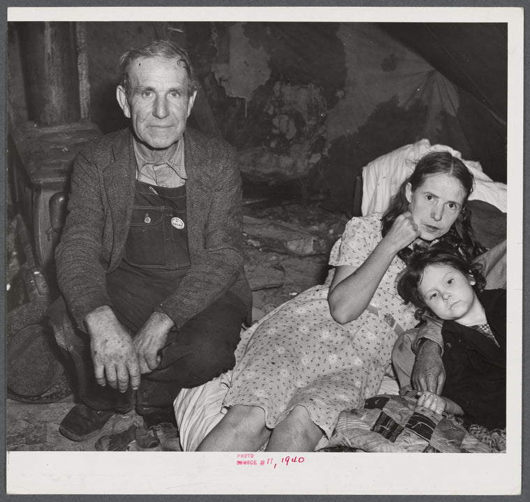 Family in tent from GA with neighbor's child, 8 or 10 men, 2 women, 2 Kids stay here permanently. Men sleep in shifts as construction workers. Women going to take in 2 neighbors' children whose tent leaks and the rain has continued for days. Alexandria.