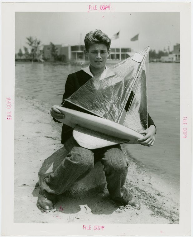 Sports - Miniature Boat Racing - Boy with model sailboat