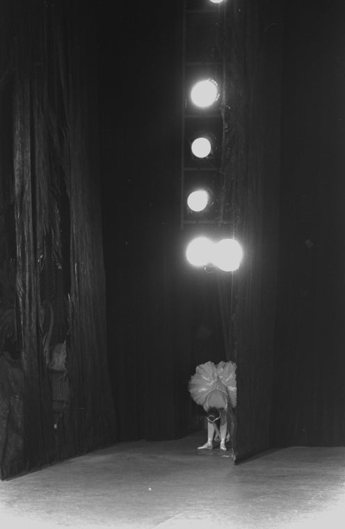New York City Ballet production of "Swan Lake" with Patricia McBride waiting in wings for her entrance, choreography by George Balanchine (New York)