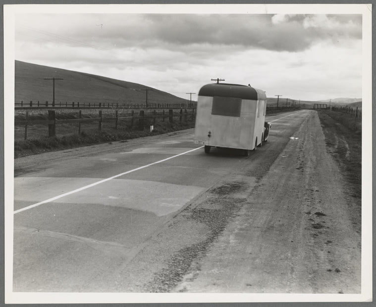 Note on "mobile housing." Car and homemade trailer on U.S. 101 near King City. Man and wife, middle-aged, from Wisconsin to California. "Old Man Depression sent us out on the road. Been out two years ... February 1936