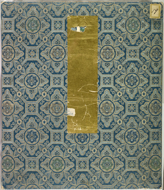 Lady seated at table, writing