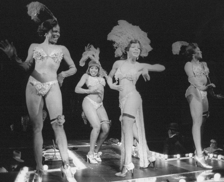 Leilani Jones (2R) with showgirls in a scene from the Broadway production of the musical "Grind".