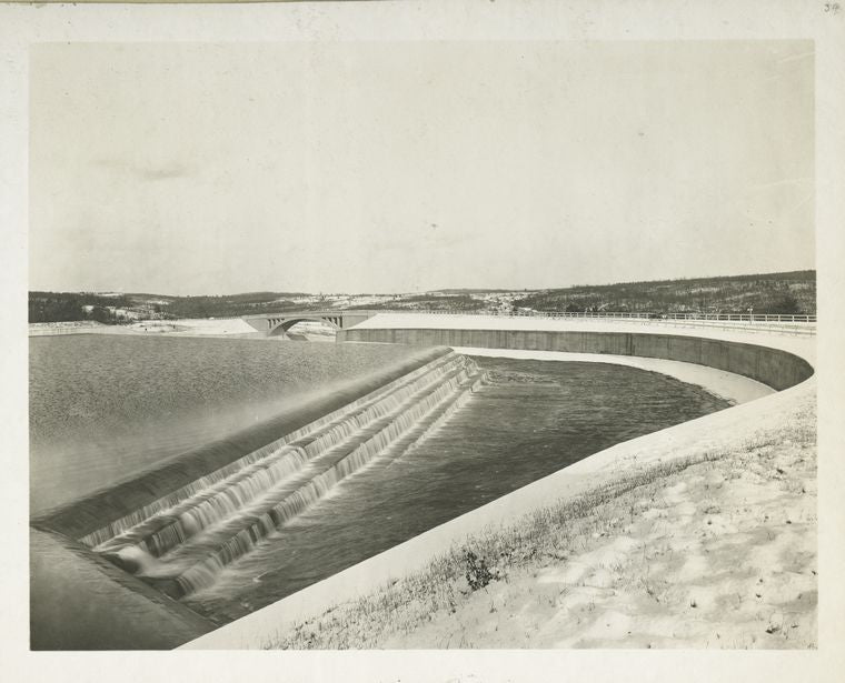 Ashokan Reservoir. Waste weir and upper end of Spillway leading to Esopus creek. Spillway bridge in background. Contract 3. December 13, 1916.