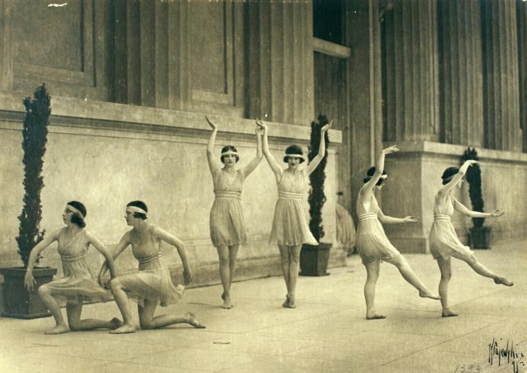 The Ruth St. Denis Concert Dancers, including Dorothea Bowen, Ruth Austin, Grace Carson, Grace Hawley, Betty May, and Katherine Laidlaw in music visualizations taken at the Greek Theatre, University of California, Berkeley.