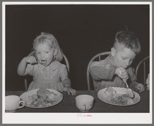Children eating lunch at WPA (Work Projects Administration) nursery school at the Agua Fria migratory labor camp. Arizona