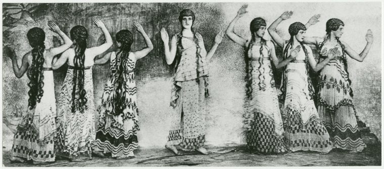 Stylized photo shot through gauze with manipulation of negative to achieve a flat, painted frieze-like effect of a line of female dancers in nymph costumes in Nijinsky’s ballet