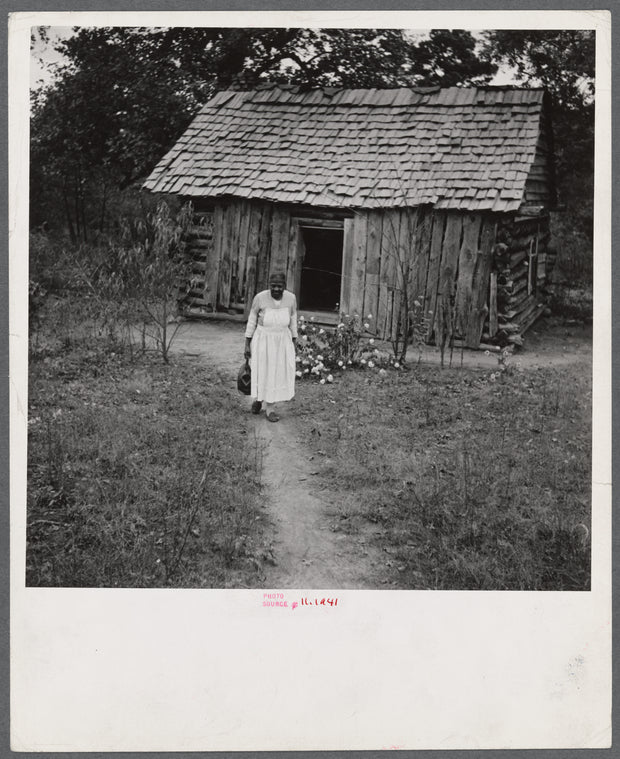 Midwife going out on a call near Siloam, Greene County, Georgia.