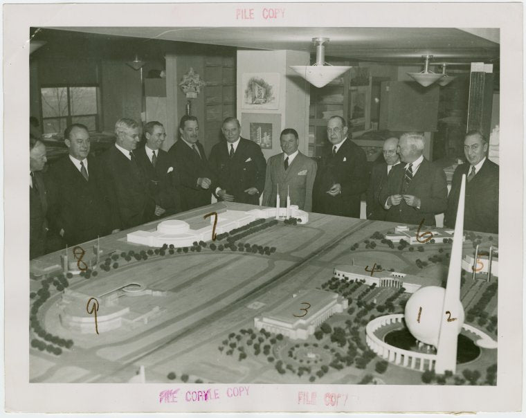 Railroads on Parade - Grover Whalen, J.M. Davis (President of the Delaware, Lackawanna, and Western Railroad and Chairman of World's Fair Committee of Eastern President's Conference), and officials looking at model