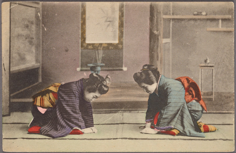 Japanese women in kneeling bow.