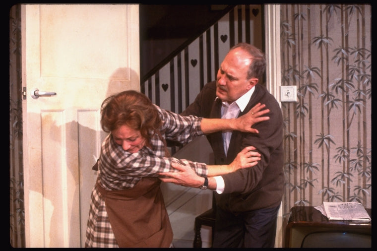 Actors George N. Martin & Rosemary Harris in a scene fr. the Broadway play "Pack of Lies." (New York)