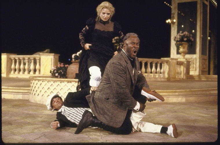 Actors (L-R) Graham Winton, Michelle Pfeiffer and John Amos in a scene from the New York Shakespeare Festival production of the play "Twelfth Night" at the Delacorte Theater in Central Park. (New York)