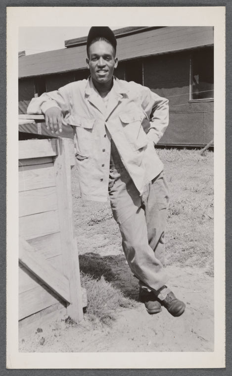 Man leaning with hand on hip