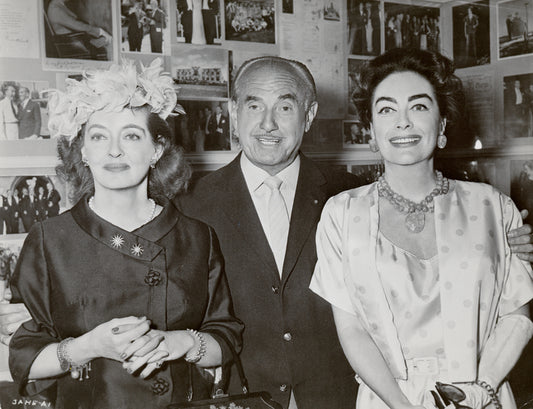 Bette Davis, Jack L. Warner and Joan Crawford during press conference for the motion picture Whatever Happened to Baby Jane?