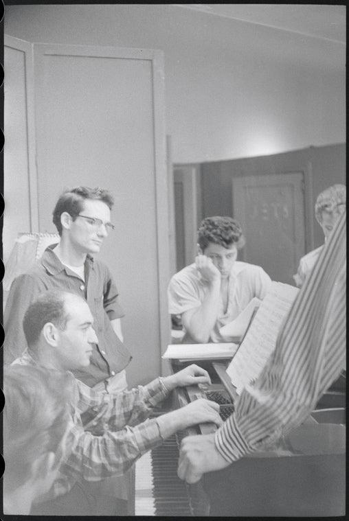 Unidentified music staff during rehearsal for the stage production West Side Story