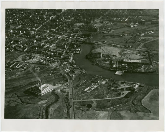 Fairgrounds - Pre-Construction - Flushing River with bridge under construction, aerial view