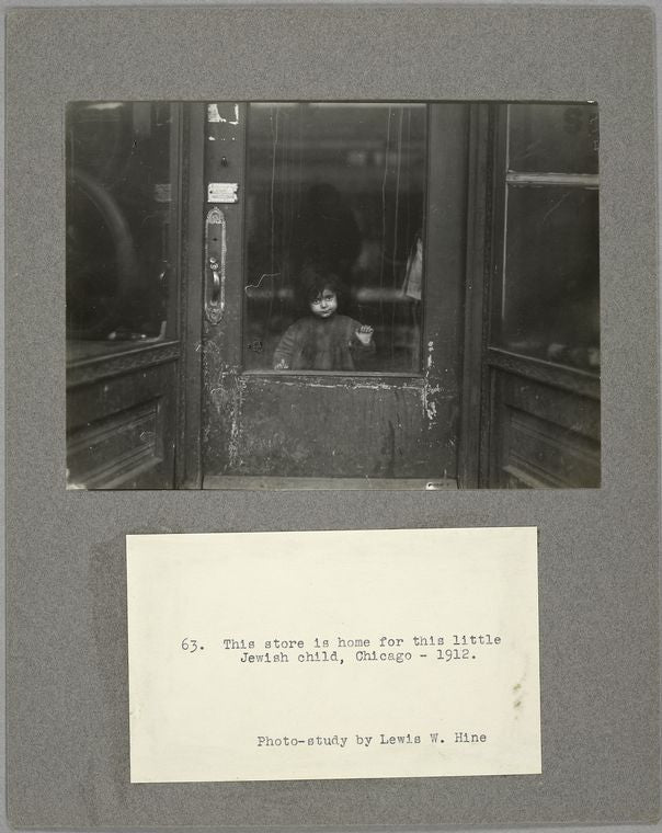 This store is home for this little Jewish child, Chicago, 1912