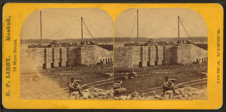 Worker sitting near the locks.