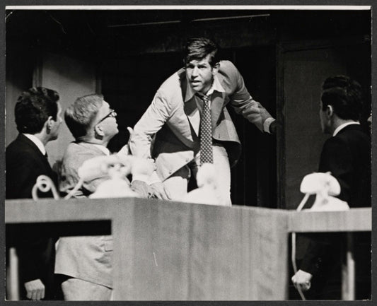 Hiram Sherman [second from left], Tony Roberts [center] and unidentified others in the stage production How Now Dow Jones