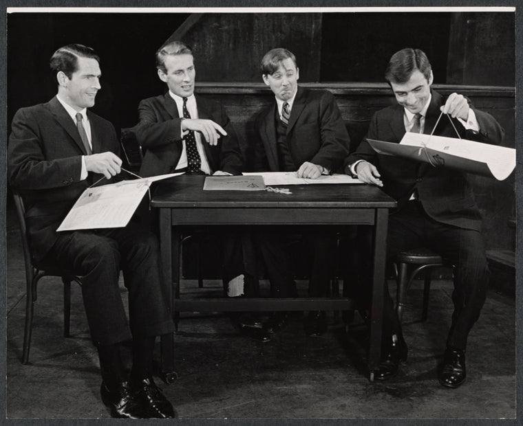Patrick Horgan, Paxton Whitehead, William Christopher and Patrick Carter in the 1963 tour of the stage production Beyond the Fringe